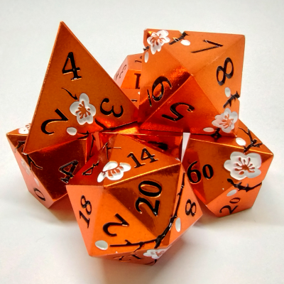 Dés fleurs de prunier - orange dans une boîte en métal