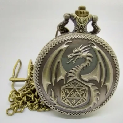 Porte-dés en métal avec mini-kit polyédrique: dragon doré avec pochette en suédine noire