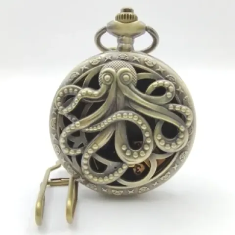 Porte-dés en métal avec mini-kit polyédrique: kraken doré caverneux avec pochette en suédine noire