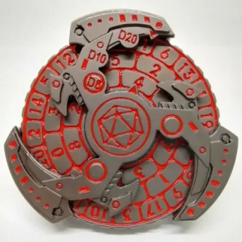Dice spinner: Triskèle machinal - acier avec rouge dans une boîte