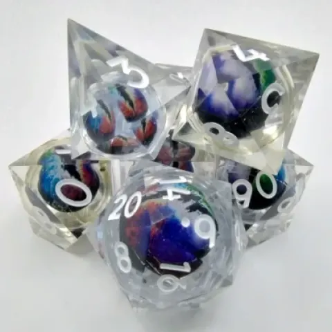 Kit de dés "Liquid Core" Oeil de Dragon - transparent avec oeil multicolore dans une bouteille avec couvercle dévisable