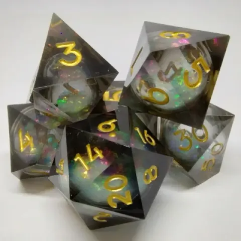 Kit de dés tourbillon de rêves - noir et or dans une bouteille avec couvercle dévisable