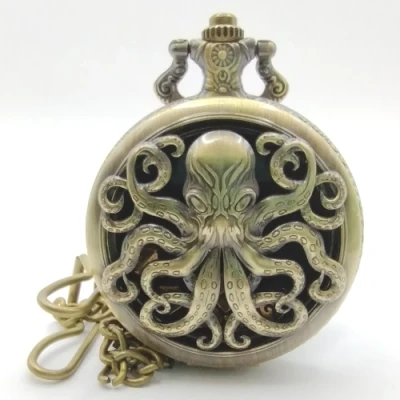 Porte-dés en métal avec mini-kit polyédrique: Cthulhu doré avec pochette en suédine noire