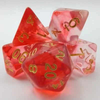 Kit de dés polyédriques – lumina – rouge translucide avec chiffres dorés